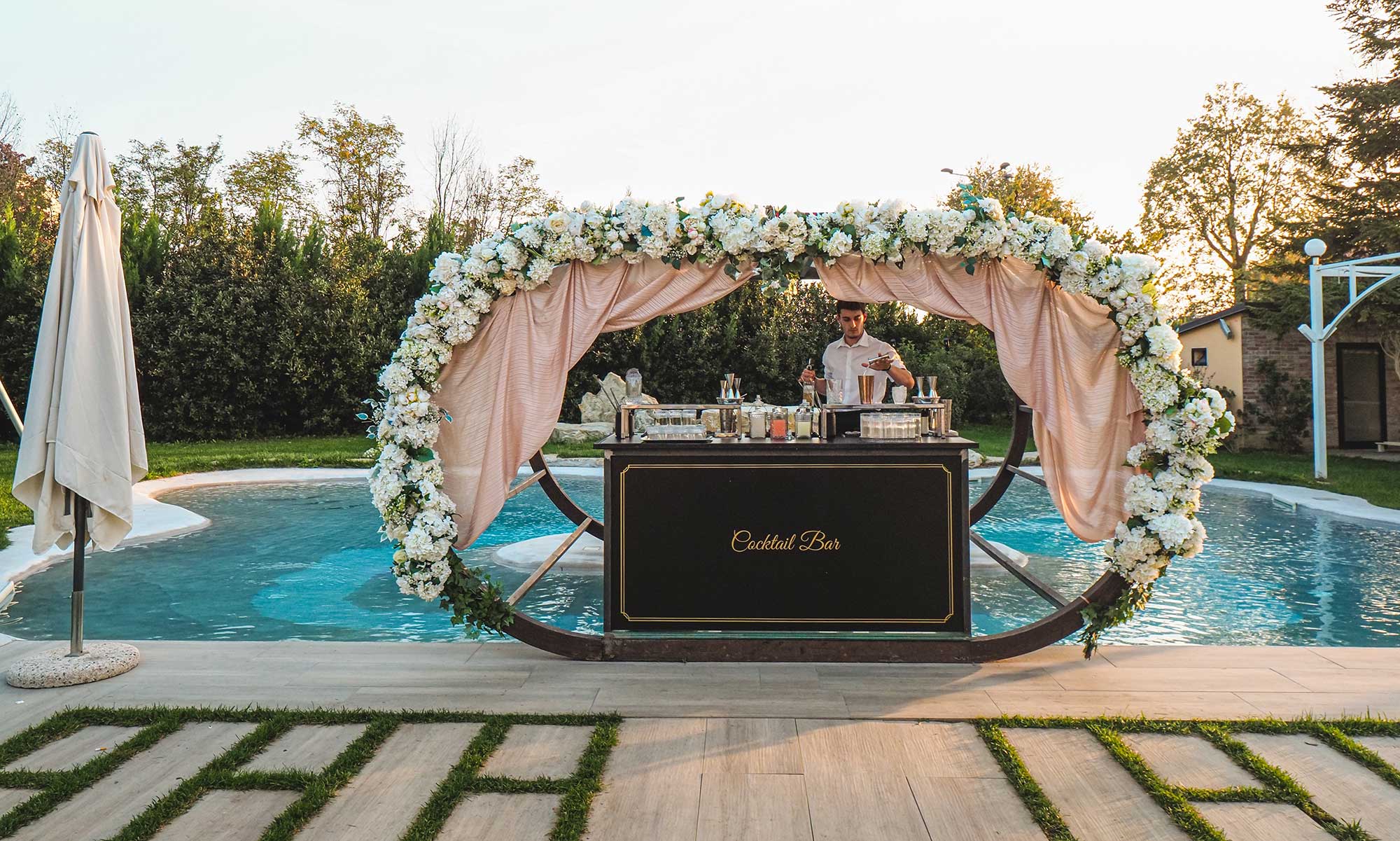 A stylish outdoor bar station highlighting the expertise and elegance of mobile bartenders at events